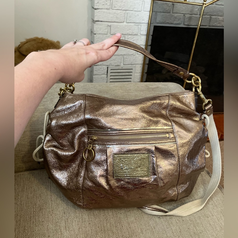 Coach gold poppy metallic purse with lace up sides